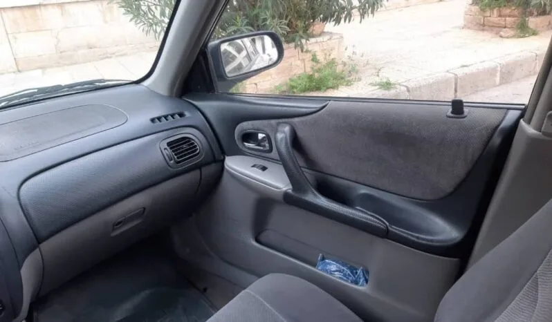 
								 مستعمل مازدا – Mazda 323 ممتلئ									