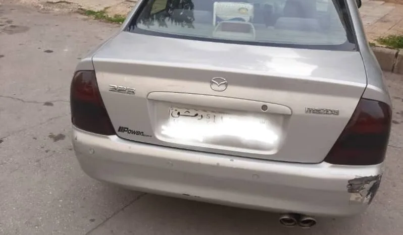 
								 مستعمل مازدا – Mazda 323 ممتلئ									