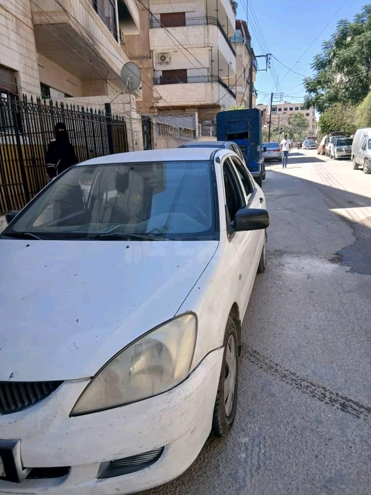 ميتسوبيشي - Mitsubishi لانسر - Lancer